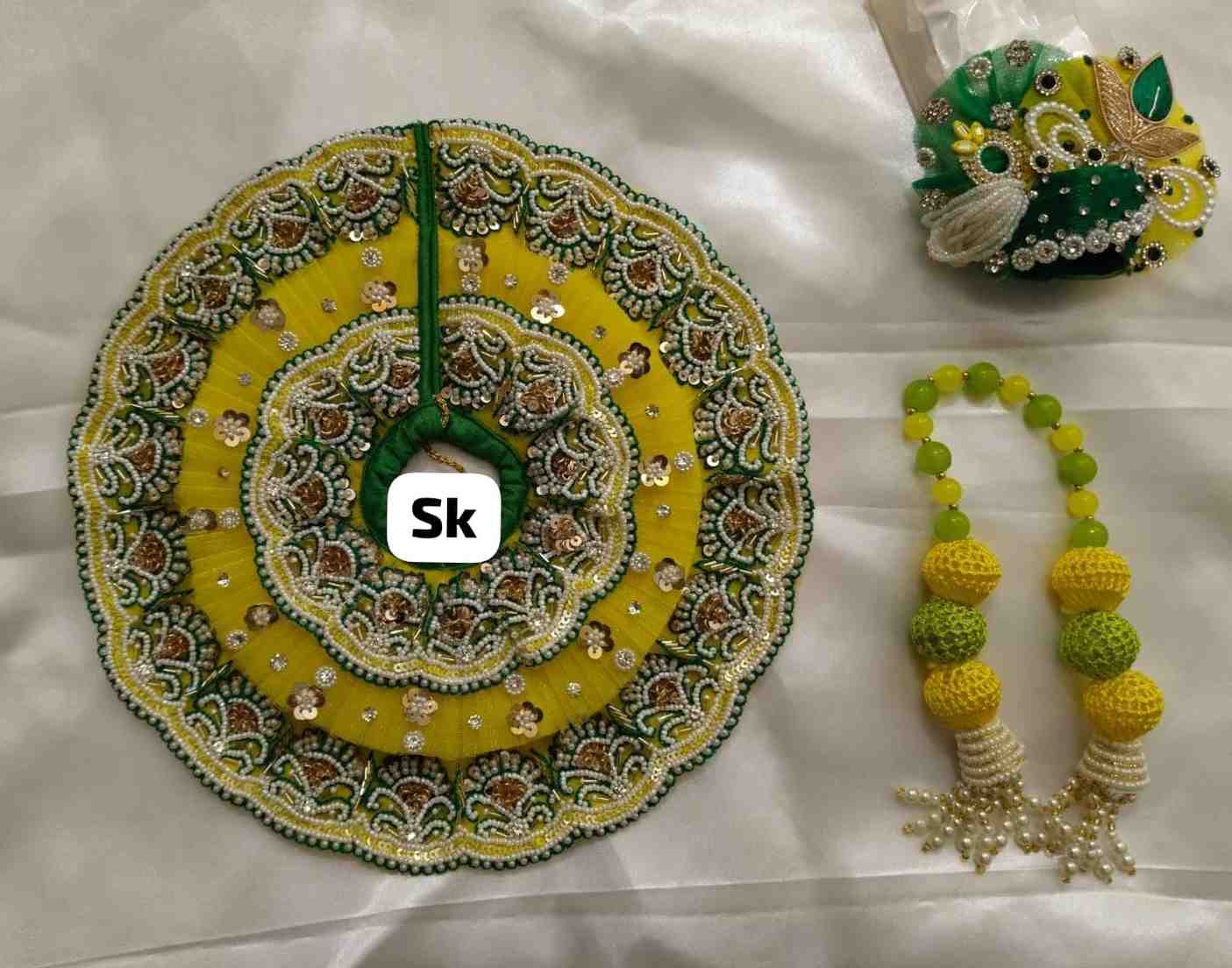 Green Laddu Gopal Poshak with Moti Work 2026 | + Pagdi& Mala | Youteek 2 Stunning Green Laddu Gopal Poshak with exquisite moti work in GL design. Custom per inch pricing with pagdi – perfect traditional dress for your Laddu Gopal Ji. Green Laddu Gopal Poshak with Moti Work 2026 | + Pagdi& Mala | Youteek - Image 2