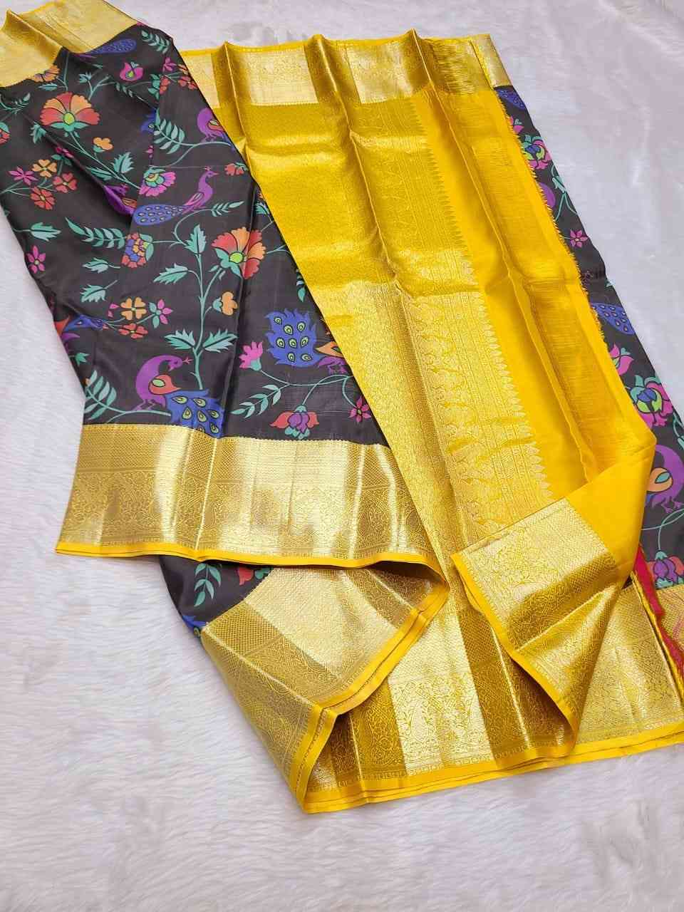 4 <p dir="auto">100% Pure Kanchipuram Handwoven Kalamkari Silk Saree with 1 Gram Gold Pure Zari Weaving and Silk Mark Certificate. Premium lightweight double warp digital print weaving offering smooth silky feel. Elegant 1G small border premium quality silk saree perfect for weddings, festivals and celebrations.</p> - Image 4