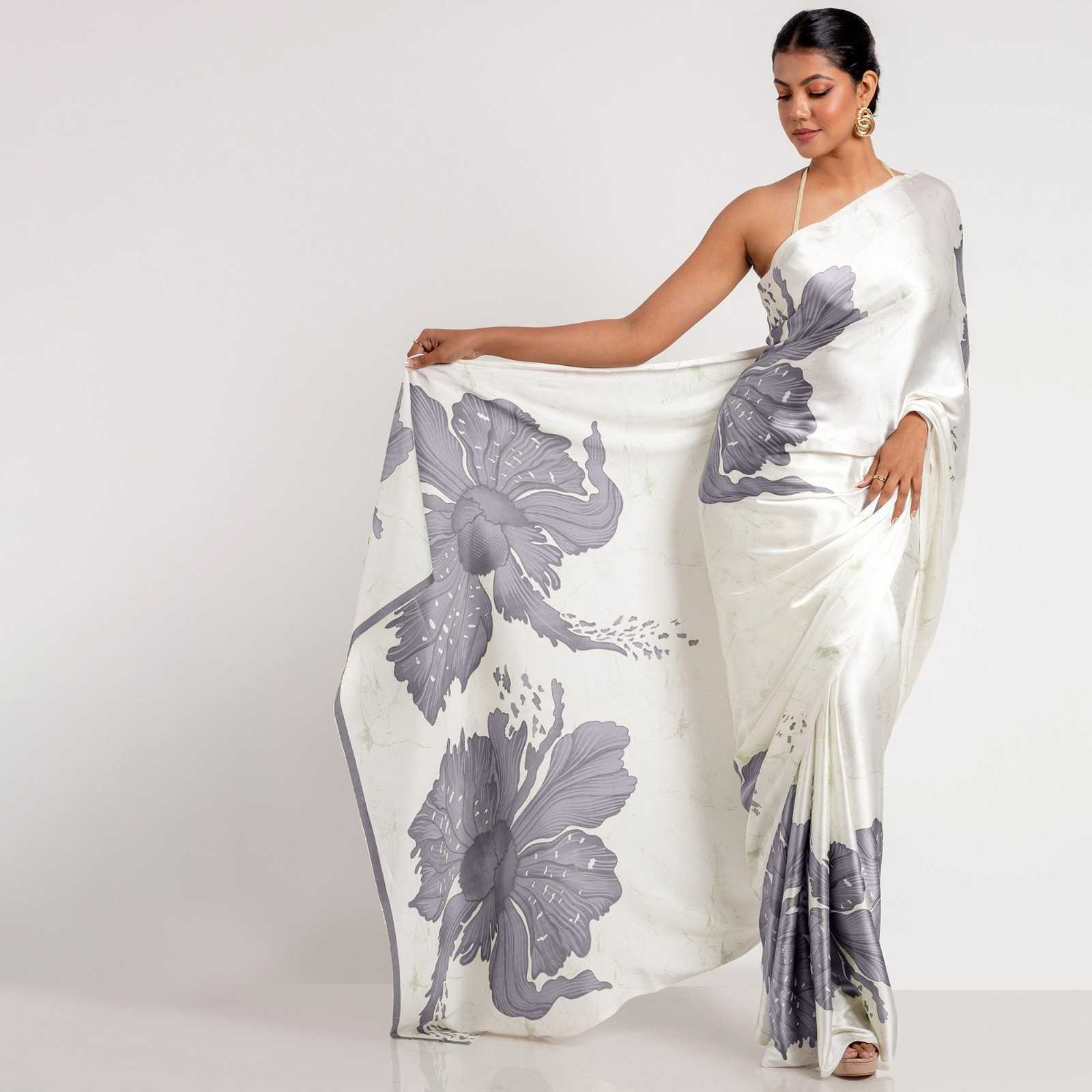 Japan Satin Digital Print Saree 2 <p dir="auto">Premium Original Japan Satin (Devsena Satin) digital print saree with 6.30 meter length and matching blouse. Perfect drape and vibrant prints for all occasions. Flash sale limited stock!</p> Japan Satin Digital Print Saree - Image 2
