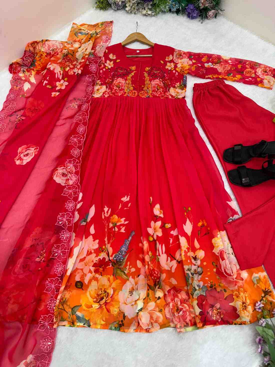 Fox Georgette Gown with Taby Silk Dupatta 3 <p dir="auto">Stunning fox georgette gown with taby silk dupatta DN-544 featuring heavy fox georgette fabric with handwork neck and sleeves, paired with heavy crepe pant and taby silk digital print dupatta with embroidery sequence work border.</p> Fox Georgette Gown with Taby Silk Dupatta - Image 3