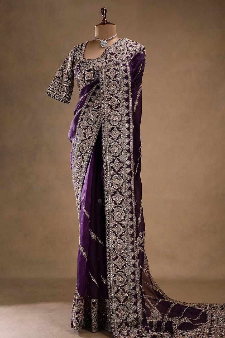 Organza Saree with Readymade Zardosi Blouse 2026 | S to 6XL | Youteek 1 Drape elegance with this Organza Saree with Readymade Zardosi Blouse. Featuring rich handwork and available in sizes S to 6XL for a perfect festive look. Organza Saree with Readymade Zardosi Blouse