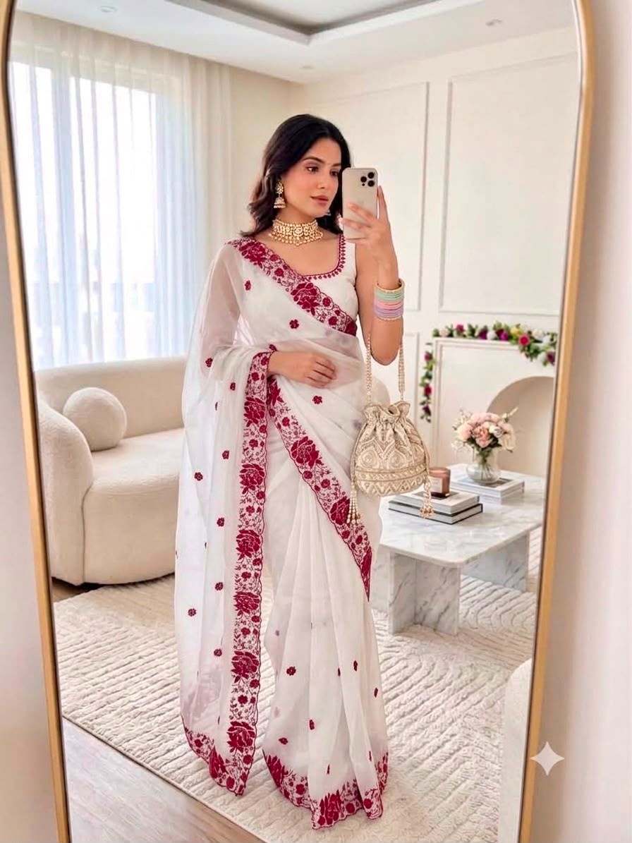 Rangoli Silk 3mm Sequins Embroidered Saree with Cutwork Border 1 Celebrity-style Rangoli Silk saree featuring 3mm sequins and embroidery work with a designer cutwork border and sequins butti across the pallu and body. Paired with a matching Rangoli silk blouse piece embellished with multi-sequence embroidery work. Rangoli Silk 3mm Sequins Embroidered Saree with Cutwork Border | Mp_819