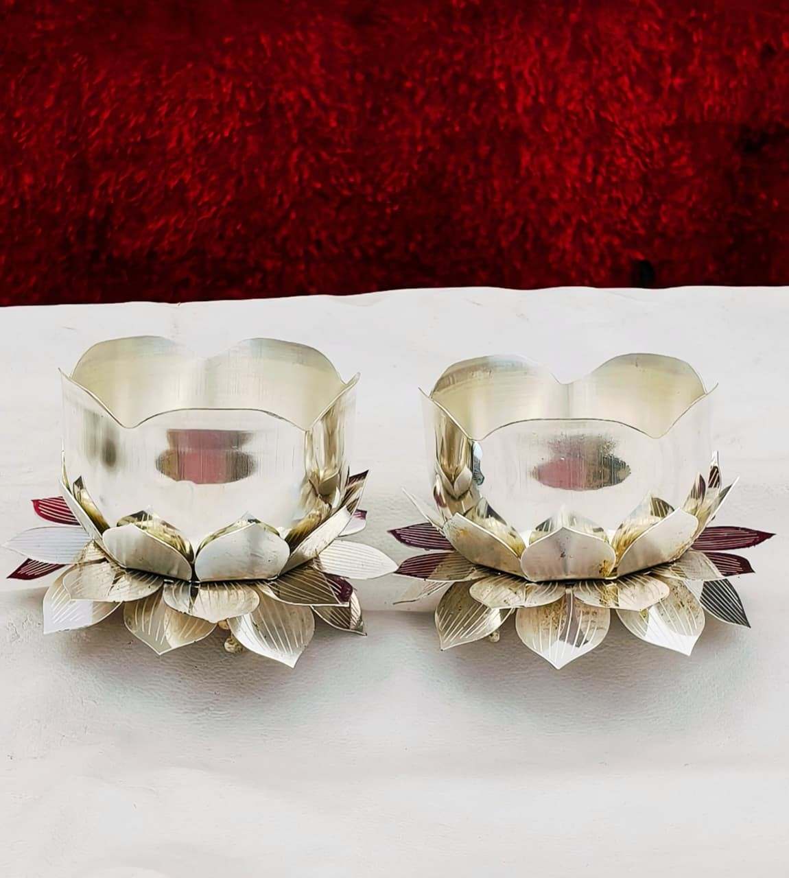 German Silver Lotus Prasad Bowl | Gold & Silver Finish 2 Elegant German silver lotus prasad bowl available in gold and silver finish. Size 4.5 inch. Perfect for puja, mandir and festive use. MOQ 2 pieces. German Silver Lotus Prasad Bowl | Gold & Silver Finish