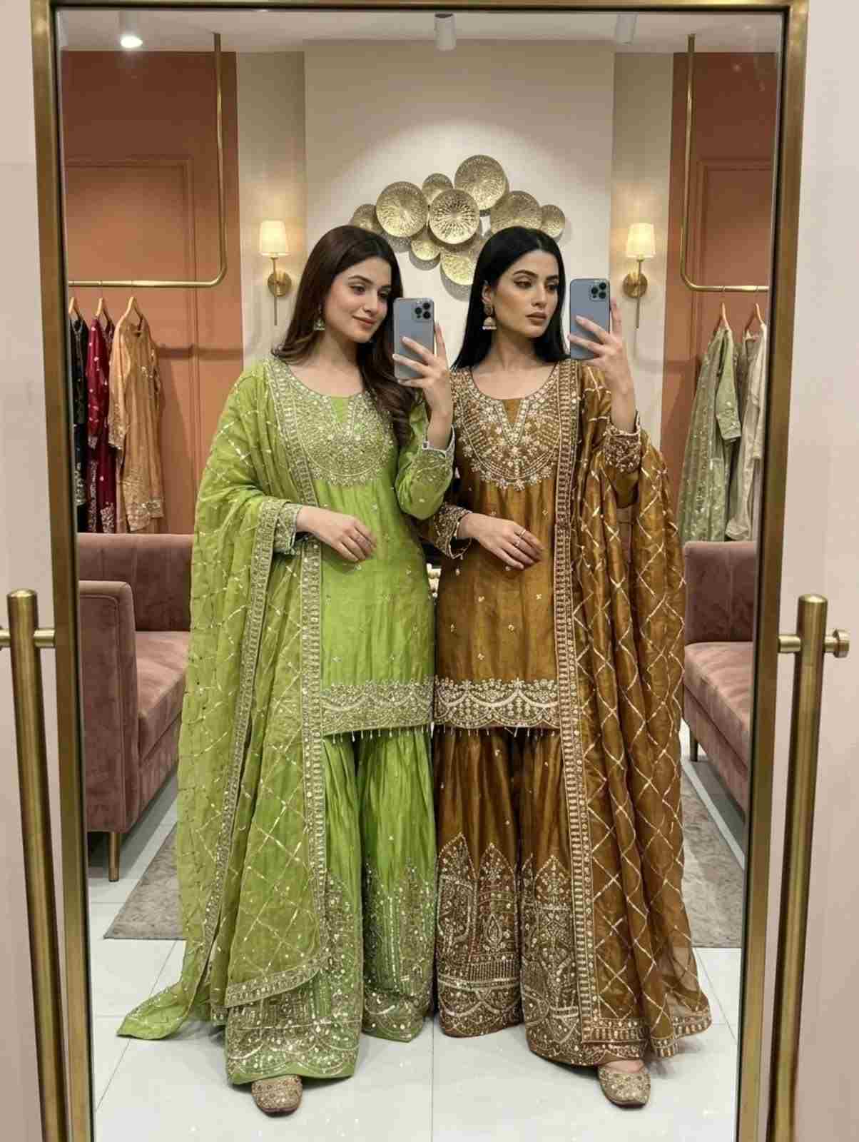 Trending Pure Fendy Silk Top Sarara Dupatta Set 2 Trending Pure Fendy-Silk top sarara and dupatta set embellished with heavy 5mm sequence embroidery and moti-latkan lace sleeves. Lined with breathable micro cotton for all-day comfort. Fully stitched in sizes M, L, XL, XXL. Trending Pure Fendy Silk Top Sarara Dupatta Set | WW-1256