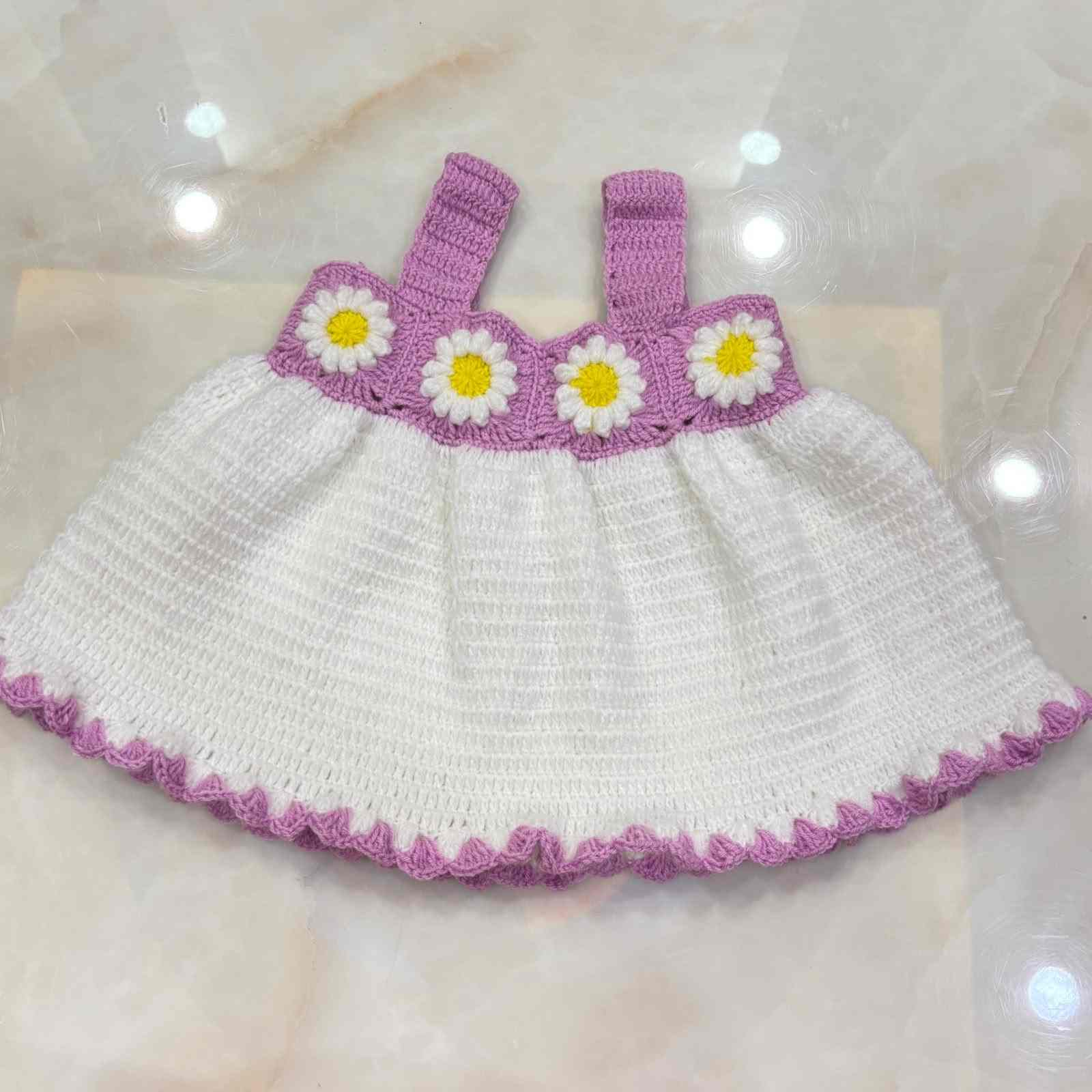 Handmade Crochet Baby Frock | 6 Months to 5 Years 9 Charming Handmade Crochet Baby Frock hand-knitted with skin-friendly, soft yarn. Designed for ages 6 months up to 5 years with vibrant color palettes, customizable fittings, and dispatch within 4–5 working days. Handmade Crochet Baby Frock | 6 Months to 5 Years