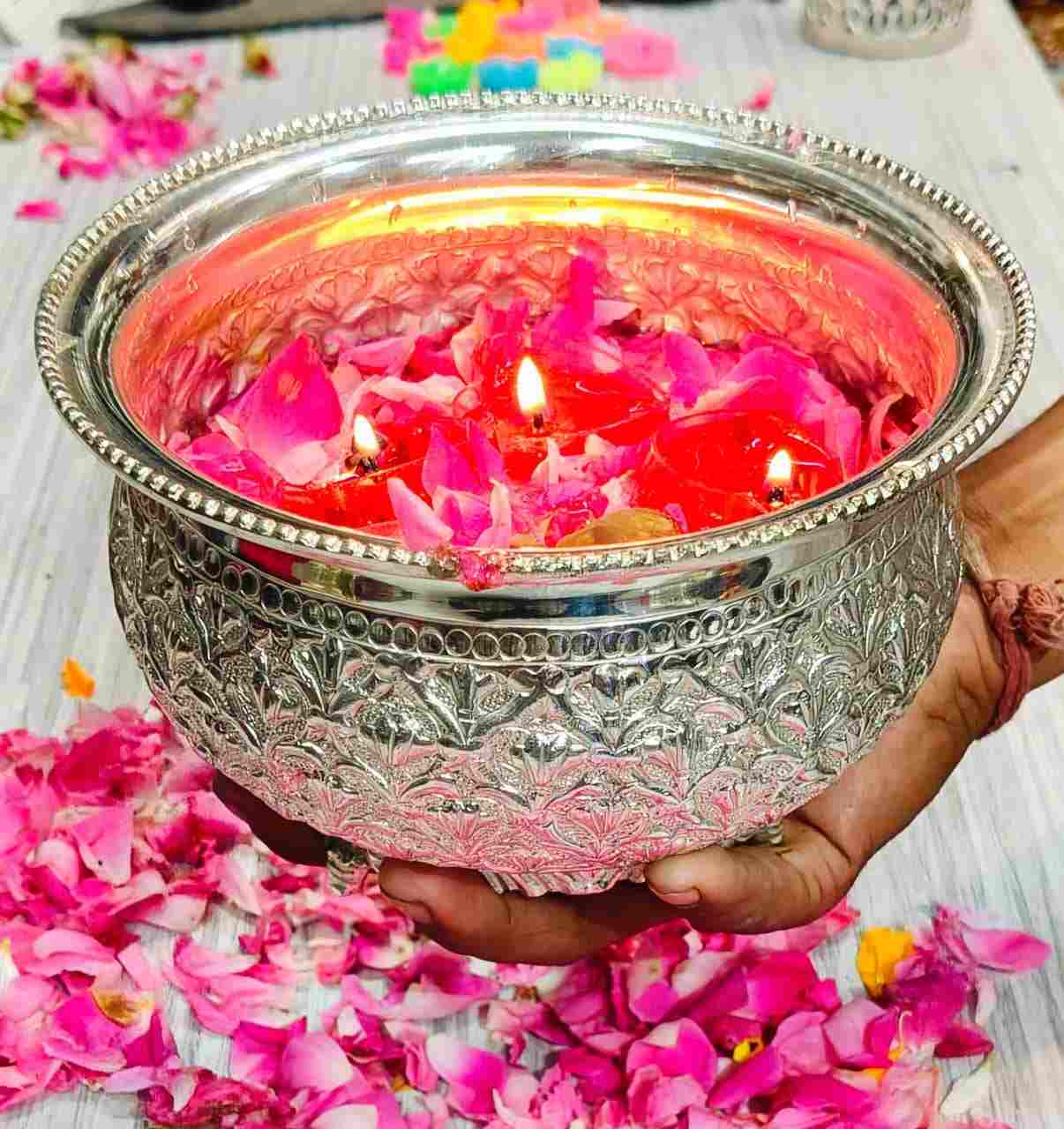 German Silver Nakkashi Urli Bowl | 6 Inch Flower Carving 1 High quality pure German silver nakkashi urli / prasadam bowl with flower carving. Size 6 inch. Never turn black. Perfect for puja and festive décor. German Silver Nakkashi Urli Bowl | 6 Inch Flower Carving