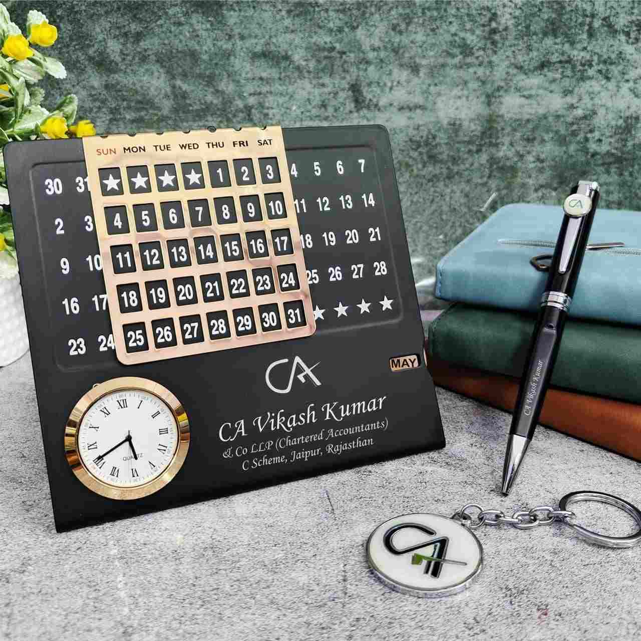 Professional Customised Desk Combo | Metal Calendar Pen Keychain – Youteek 2 Professional Customised Desk Combo – Metal Infinite Calendar Table Top with Clock + Metal Pen + Metal Keychain. Any name, logo or designation can be customised. Available in Doctor, Advocate, CA & Basic themes. Box packing. Making time 3 days. Professional Customised Desk Combo