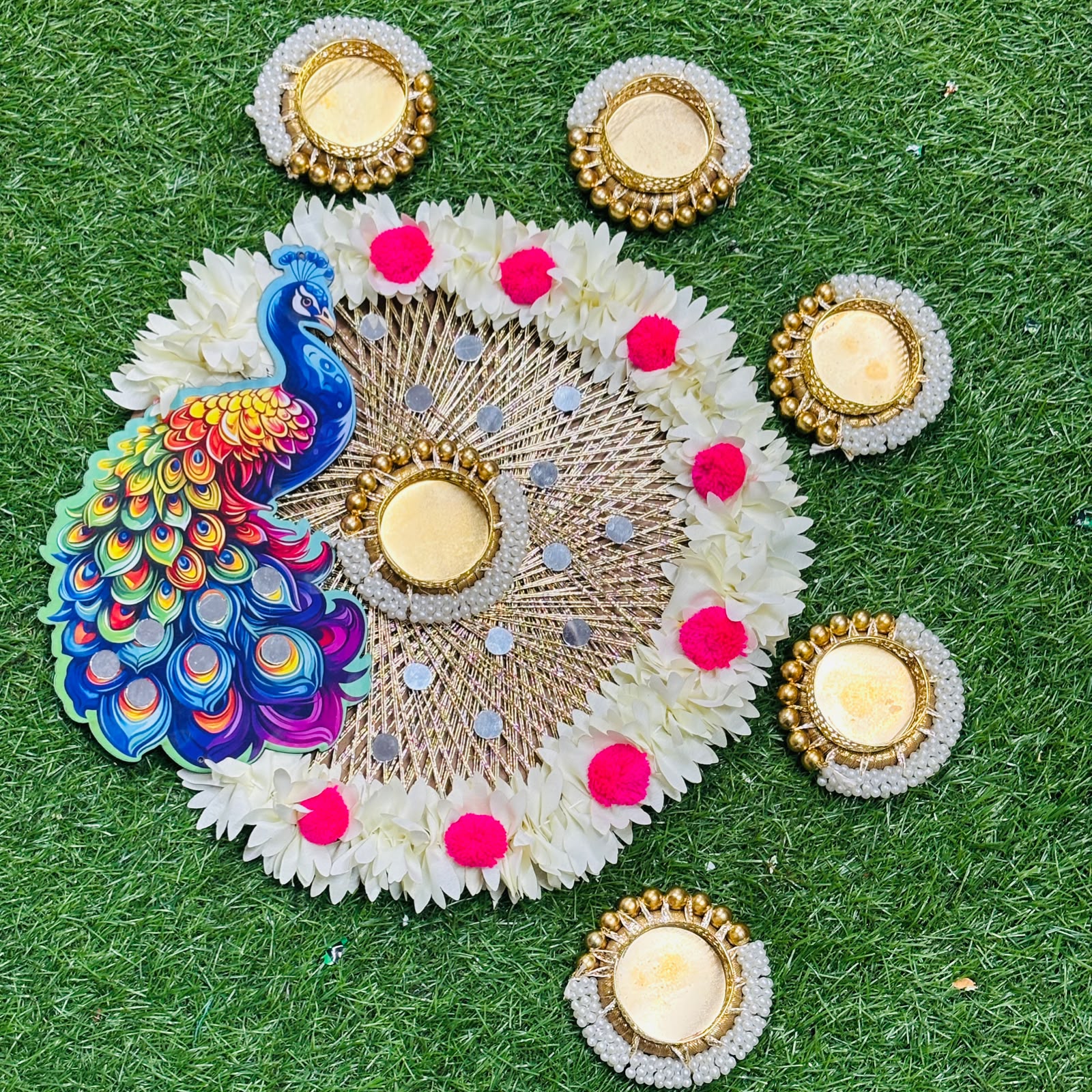 Handmade Peacock Rangoli Platter | 10 Inch with T-Light Holders 1 100% handmade 10 inch peacock rangoli platter with central T-light holder and 5 side holders. Perfect for puja room, mandir, Diwali, housewarming and gifting. Easy to assemble. Handmade Peacock Rangoli Platter | 10 Inch with T-Light Holders