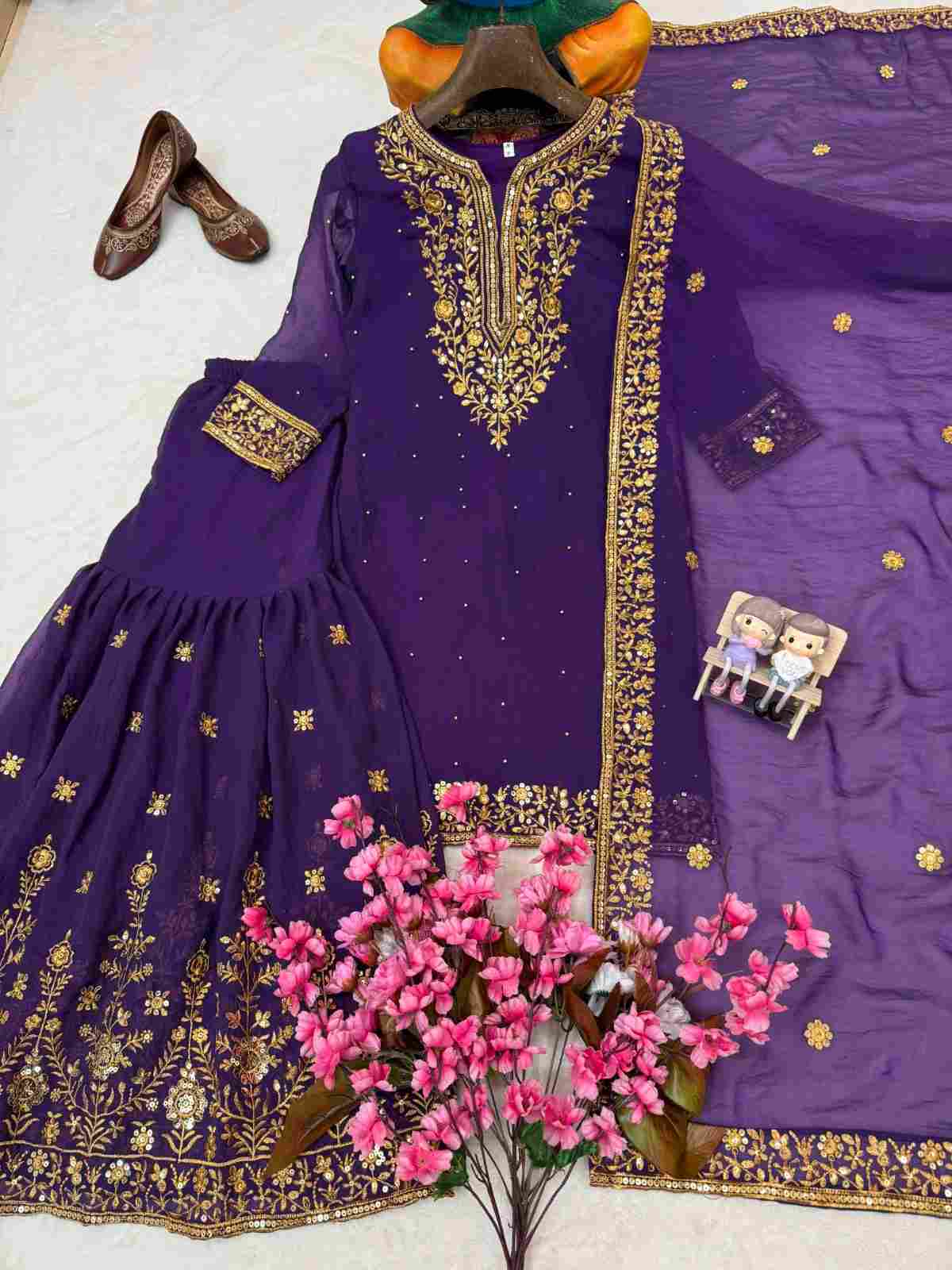 Premium NC Moss Silk Embroidered Kurti Sharara Set with Dupatta 4 Premium NC Moss Silk embroidered kurti sharara set with heavy 5mm sequence, rich gold zari, and pearl moti work. Features soft micro crepe inner lining and a matching embroidered dupatta. Fully stitched in sizes M, L, XL, XXL. Premium NC Moss Silk Embroidered Kurti Sharara Set with Dupatta | LC 1508