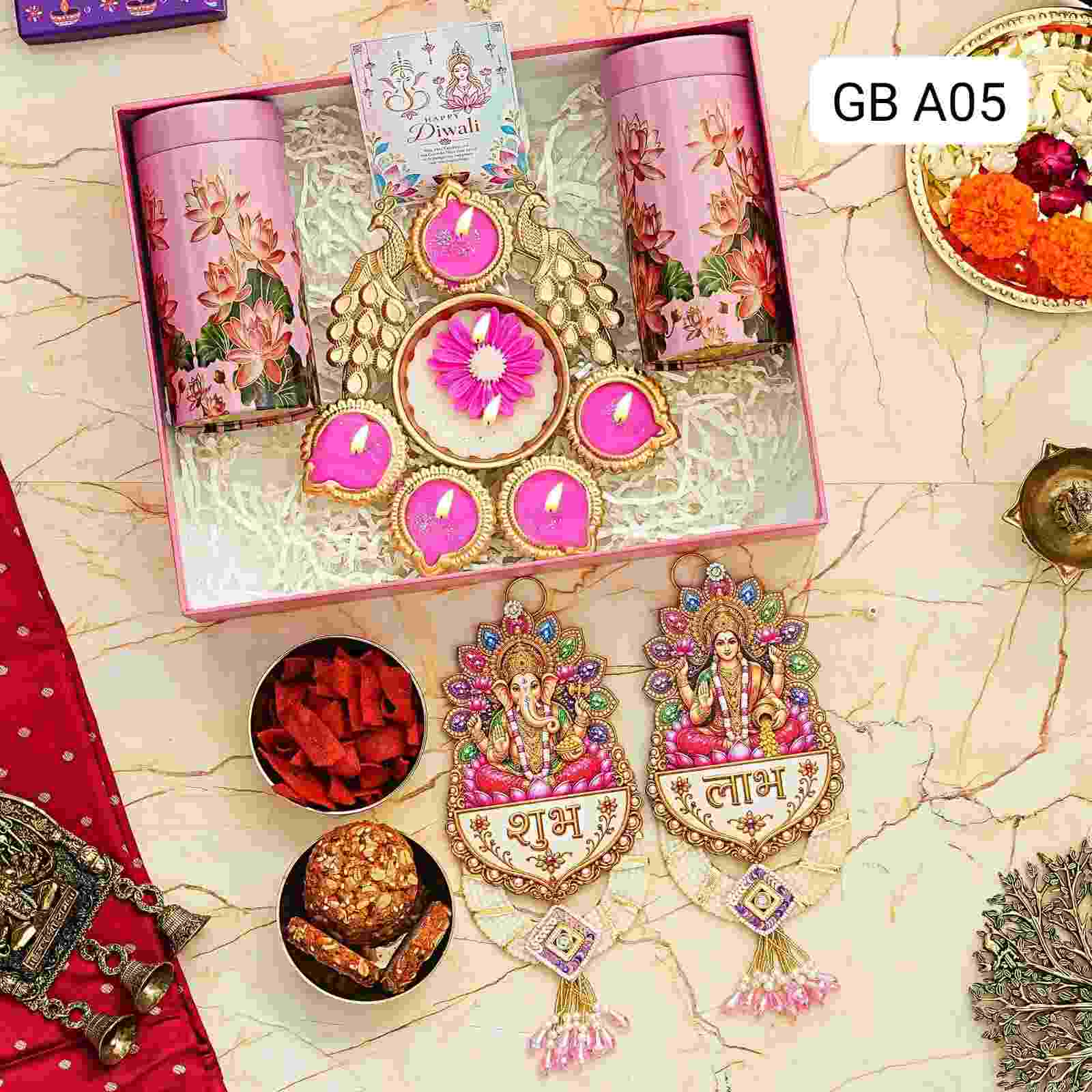 Shubh Labh Royale Hamper | Festive Diwali Gift Box 2 Luxury Shubh Labh Royale Hamper featuring heavy Shubh Labh hangings, 6-inch wax peacock urli, 2 tin jars with gourmet treats, and a Diwali card in a premium box. Shubh Labh Royale Hamper | Festive Diwali Gift Box