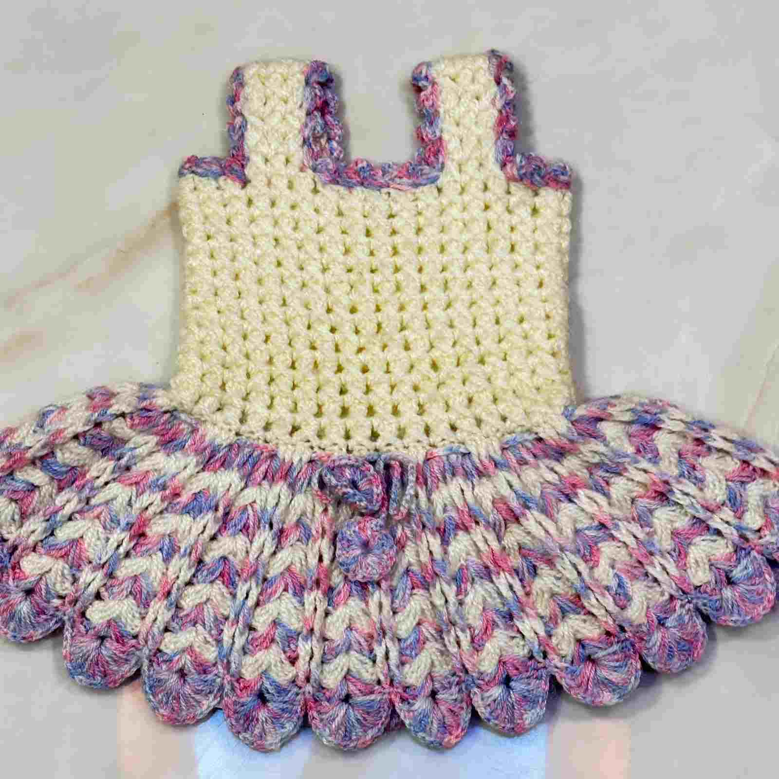 Handmade Crochet Baby Frock | 6 Months to 5 Years 2 Charming Handmade Crochet Baby Frock hand-knitted with skin-friendly, soft yarn. Designed for ages 6 months up to 5 years with vibrant color palettes, customizable fittings, and dispatch within 4–5 working days. Handmade Crochet Baby Frock | 6 Months to 5 Years