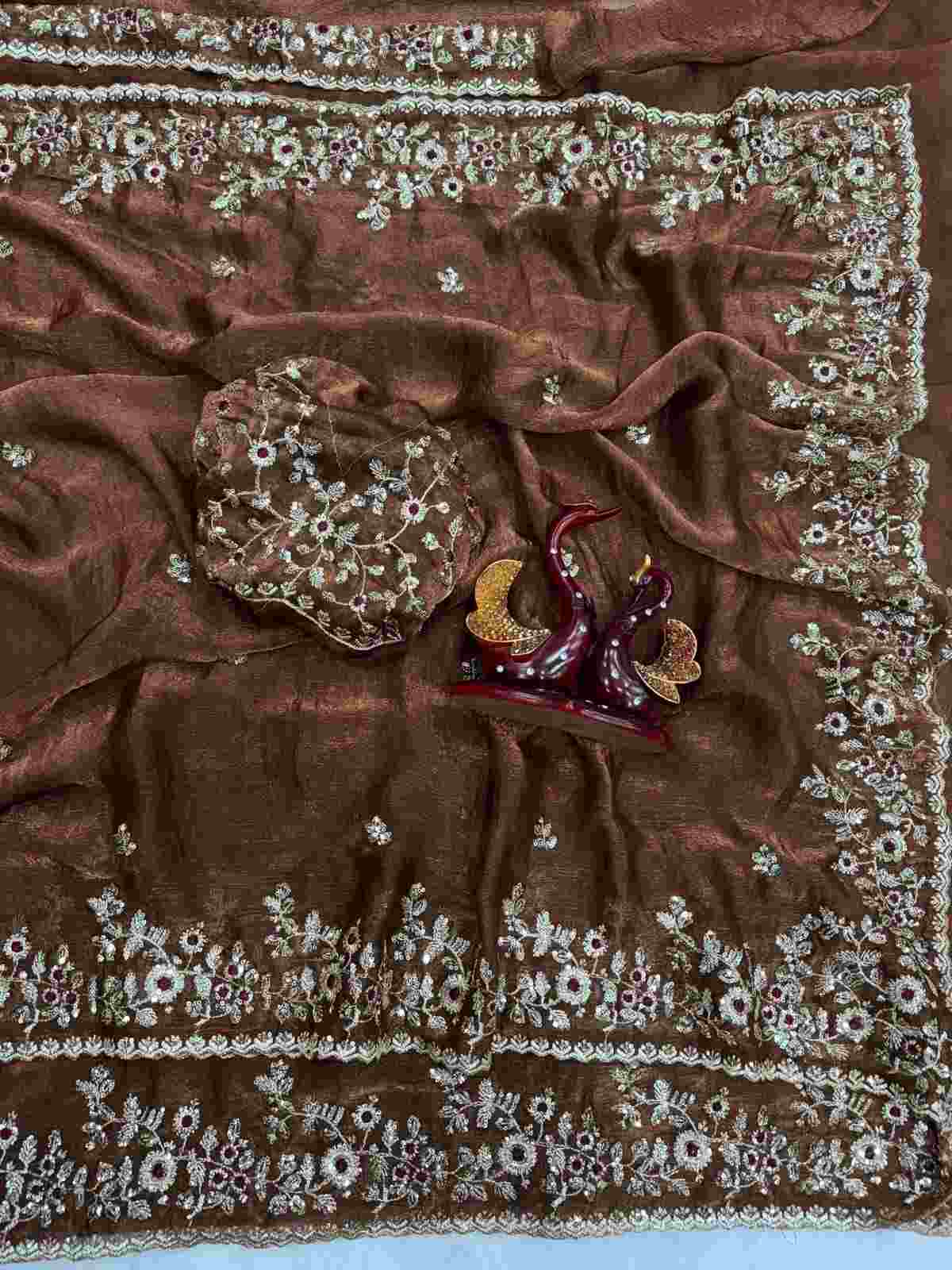 Frendy Chiffon Sequence Embroidery Saree 3 Trending designer party wear Frendy Chiffon saree featuring intricate sequins floral embroidery work across the drape, available in 13 vibrant colors. Includes a matching unstitched Frendy Chiffon blouse piece with heavy sequins work. Frendy Chiffon Sequence Embroidery Saree | NC-5461