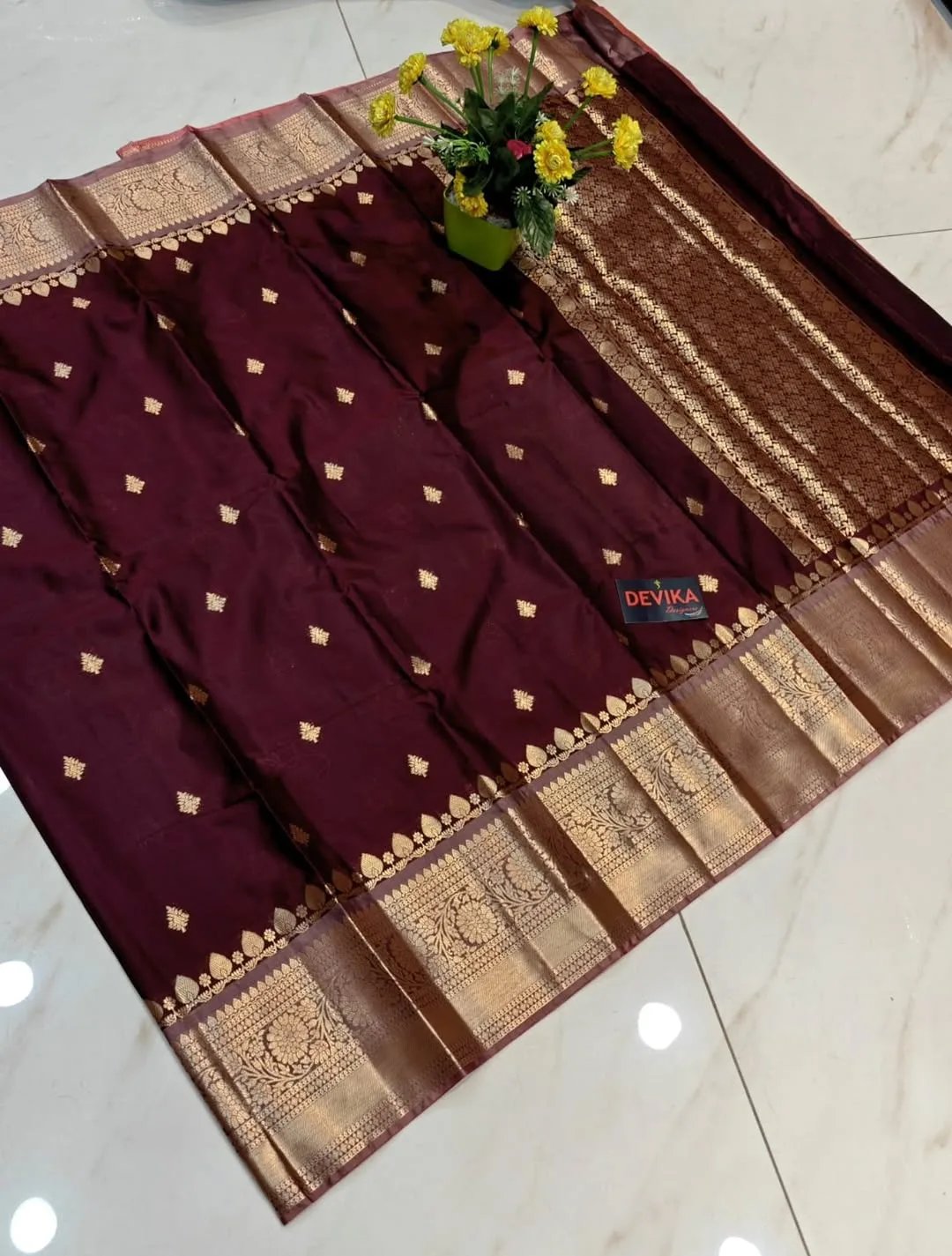 Banaras Soft Silk Copper Zari Thilagam Butta Saree | Youteek 1 Pure Banaras soft silk saree in deep mahogany brown with copper zari thilagam buttas, contrast copper zari border and matching 80-point copper jacquard blouse. Festive wear. banaras soft silk copper zari thilagam butta saree