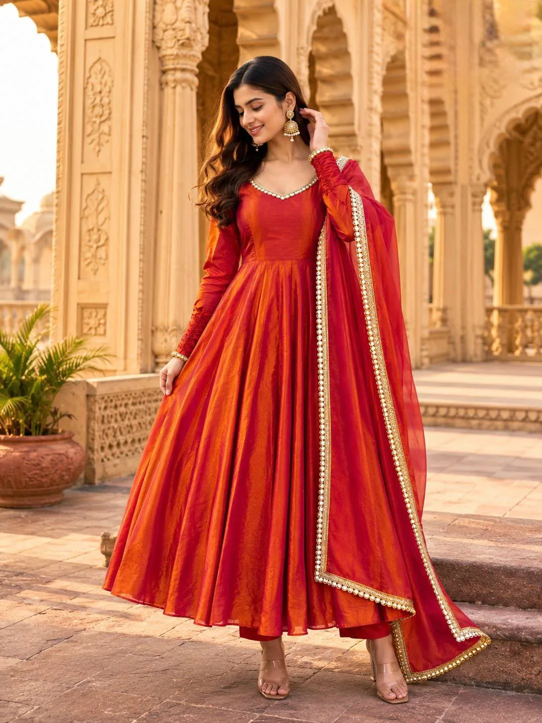 Fendy Silk Mirror Gown Set | Fully Stitched 2 Fully stitched fendy silk gown set with real mirror work. Gown length 52 inches, round dori neck, 20 inch sleeves. Micro cotton pant 38 inches. Dupatta 2.20 meters. Sizes M to XXL. Code 5075. Weight 0.7 kg. Fendy Silk Mirror Gown Set