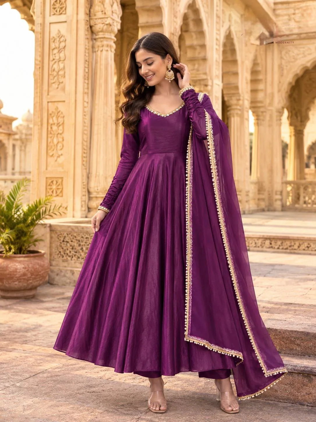 Fendy Silk Mirror Gown Set | Fully Stitched 1 Fully stitched fendy silk gown set with real mirror work. Gown length 52 inches, round dori neck, 20 inch sleeves. Micro cotton pant 38 inches. Dupatta 2.20 meters. Sizes M to XXL. Code 5075. Weight 0.7 kg. Fendy Silk Mirror Gown Set