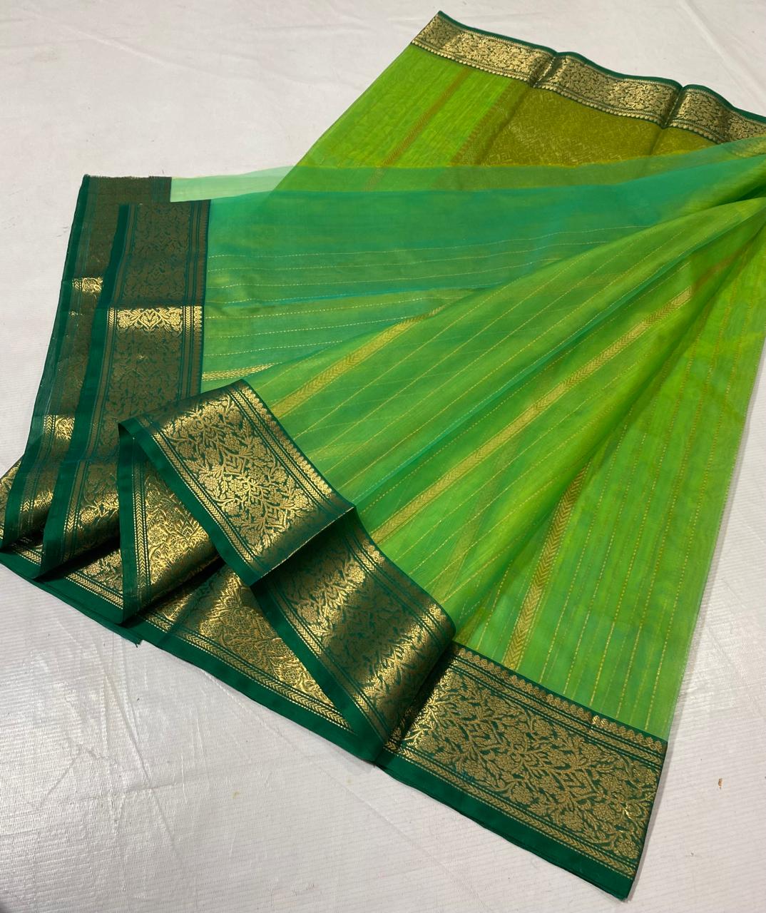 Green Katan Silk Saree for Wedding Trousseau | Original Handloom | Youteek 3 Original green katan silk saree for wedding trousseau in handloom Chanderi. Pure silk with zari work. Light drape for mehendi and bridal collections. Free shipping across India. green katan silk saree for wedding trousseau