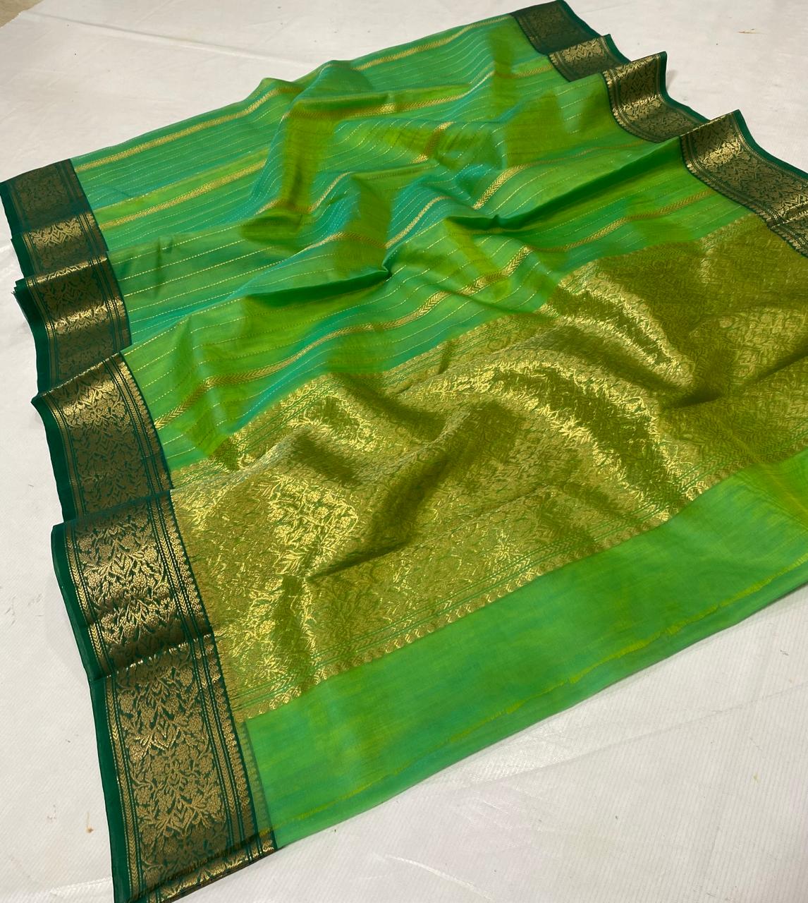 Green Katan Silk Saree for Wedding Trousseau | Original Handloom | Youteek 1 Original green katan silk saree for wedding trousseau in handloom Chanderi. Pure silk with zari work. Light drape for mehendi and bridal collections. Free shipping across India. green katan silk saree for wedding trousseau