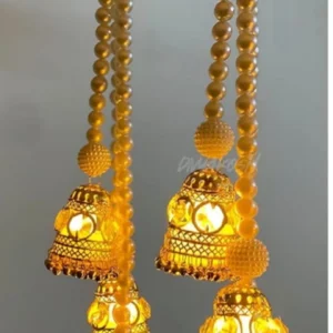golden jhumka lamp with pearl strings