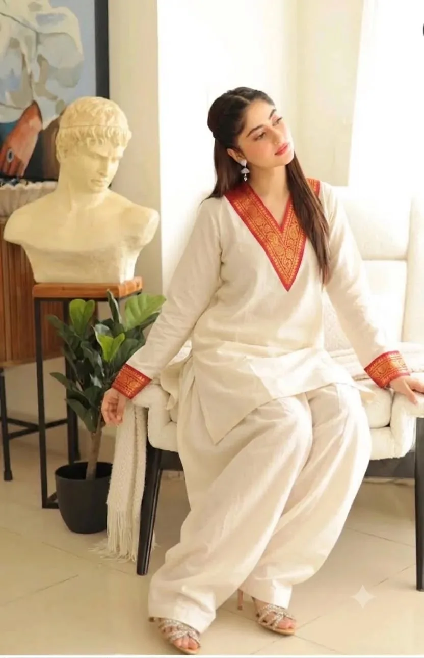 Jute Cotton Farshi Suit Set with Banarasi Border | Youteek 2 Jute cotton 2-piece farshi suit set with Banarasi borders on neck and sleeves. Top 34 inches, pants 38 inches. Sizes M to 6XL (38 to 52 chest). Shipping extra. Ready to ship. jute cotton farshi suit set with banarasi border