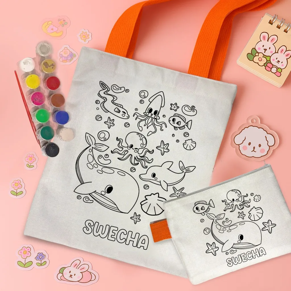 Kids Tote Bag Coloring Combo | DIY Pouch and Paint Set 2 DIY kids tote bag and pouch coloring combo in laminated poly jute. Tote 11x14 inch, pouch 8x6 inch, with 12 tempera colours and a paint brush. For birthdays and return gifts. Kids Tote Bag Coloring Combo
