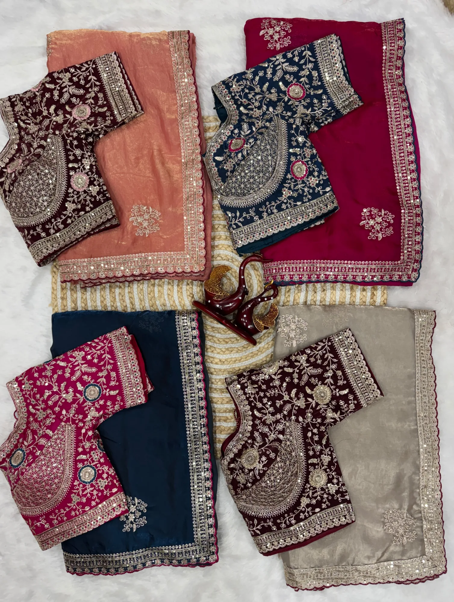 Soft Satin Saree with Embroidered Blouse 5 Exquisite Soft Satin Saree with Embroidered Blouse crafted from luxury Soft Frendy Satin Fabric with Shimmering Sequence and Zari Embroidery. Paired with Premium Heavy Front & Back Embroidered Blouse (Full Stitch Size 40, Alterable). Boutique quality guaranteed. Soft Satin Saree with Embroidered Blouse