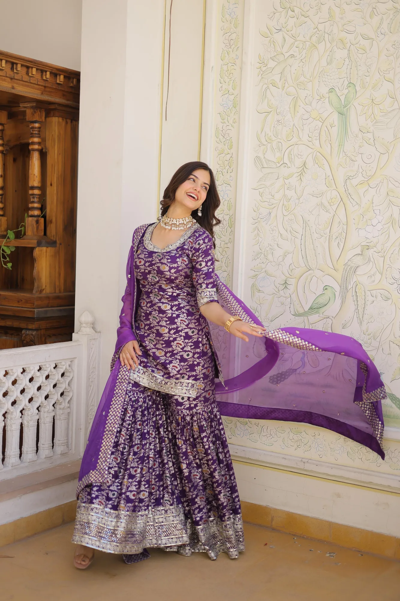 Stitched Gharara Suit with Dupatta | Youteek 2 Premium designer readymade stitched gharara suit with dupatta. Viscose jacquard sequins and zari embroidery, elbow sleeves, elastic waist gharara, Russian silk dupatta with lace border. Fully stitched S to XXL in purple. stitched gharara suit with dupatta