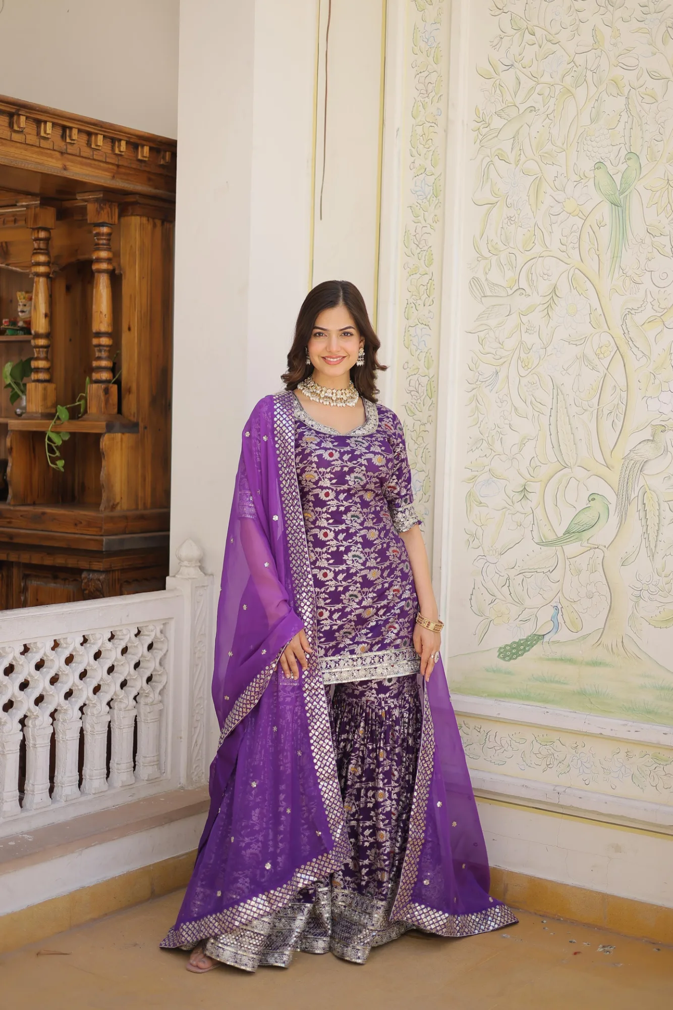 Stitched Gharara Suit with Dupatta | Youteek 1 Premium designer readymade stitched gharara suit with dupatta. Viscose jacquard sequins and zari embroidery, elbow sleeves, elastic waist gharara, Russian silk dupatta with lace border. Fully stitched S to XXL in purple. stitched gharara suit with dupatta